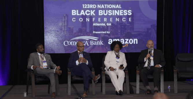 Panel Members sitting in front of audience at NBCC conference.